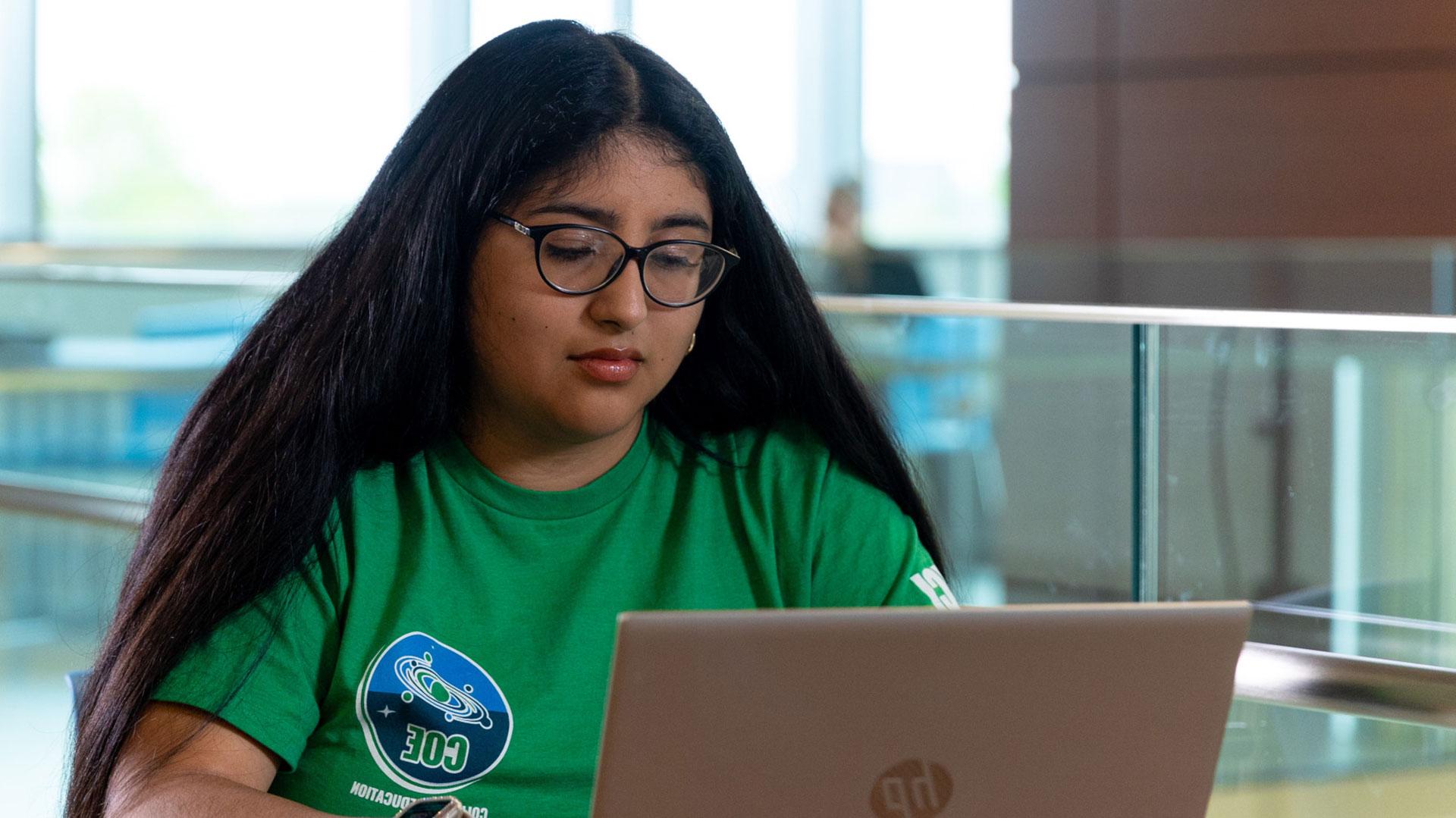 Student in front of laptop